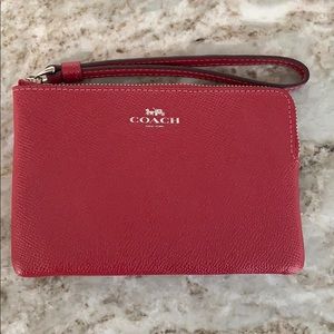 Coach wristlet. NWT. Dark pink. Adorable!